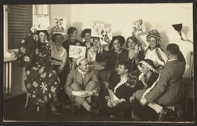 Party at Otti Berger's. Berger, back row far right, with headdress